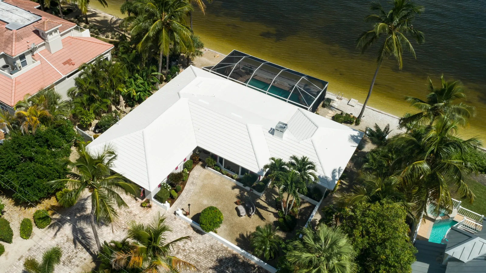 White metal roofing across the main roof
