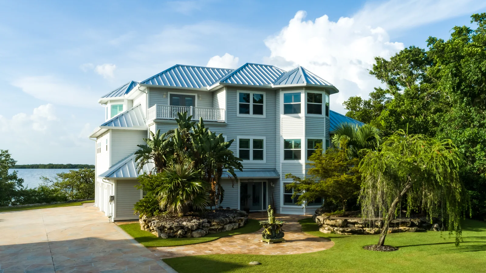 Blue metal roofing on a coastal home, St. James City