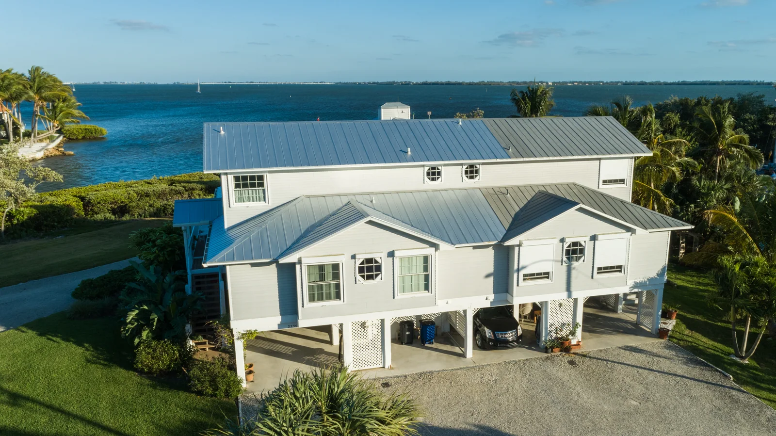 Front view of metal roofing on a waterfront home, St. James City
