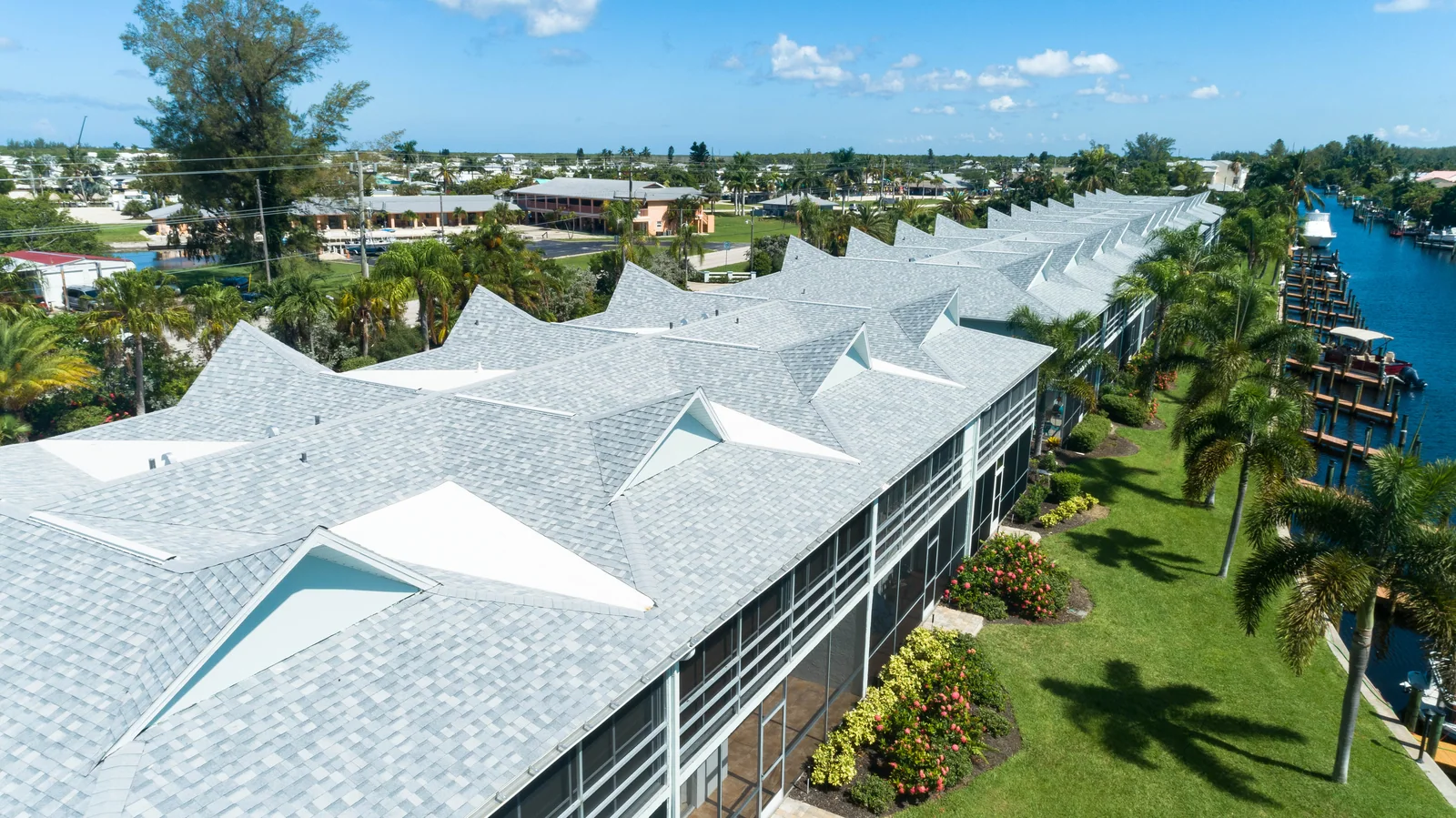 Aerial view of shingle roofing at intersecting gables