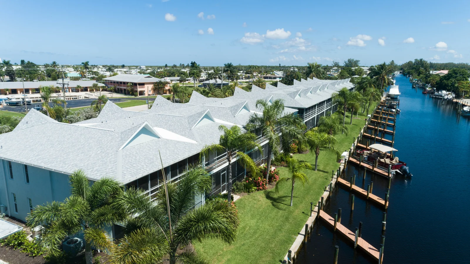 Shingle roofing across a waterfront multi-unit property