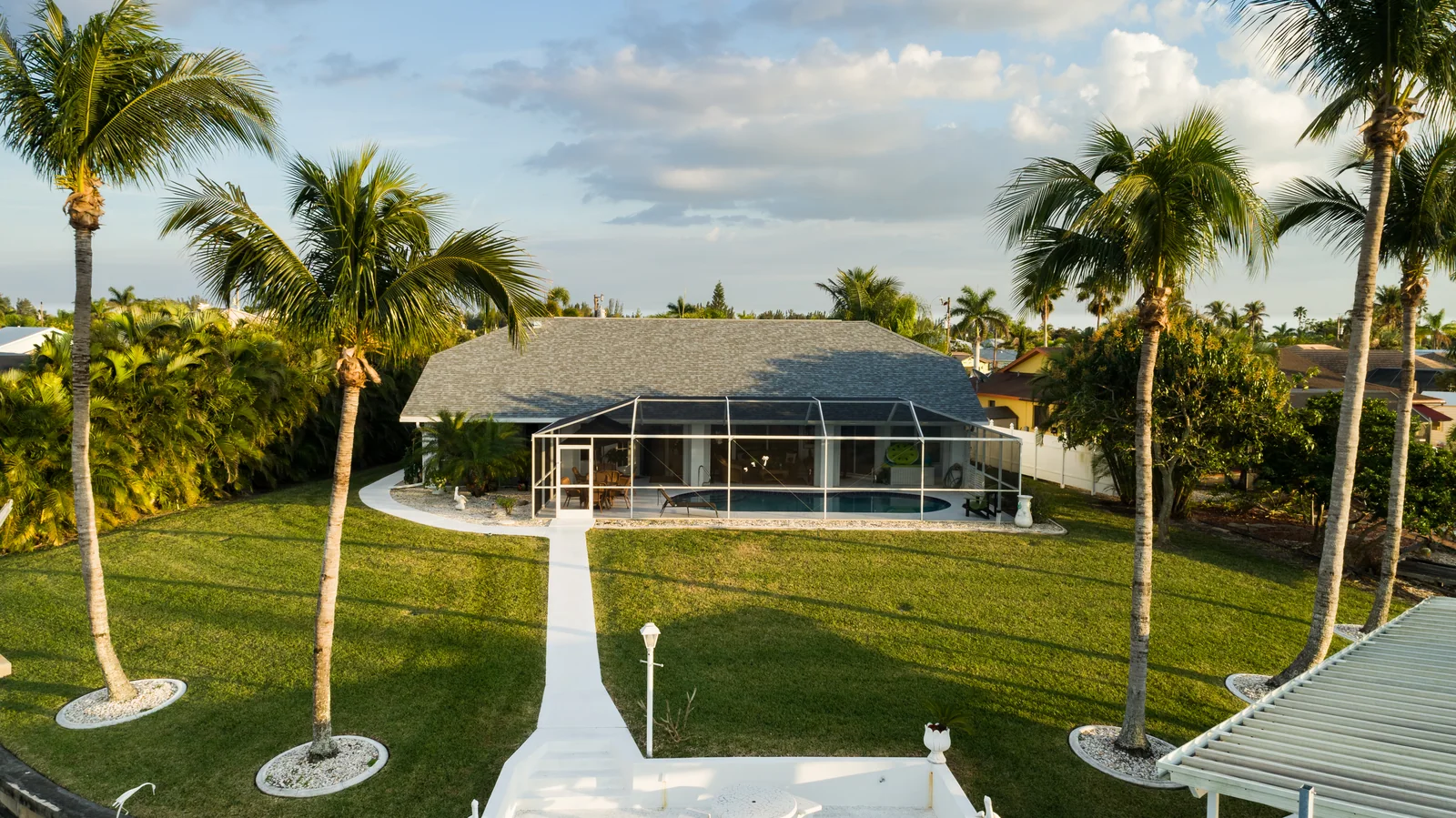 Shingle roofing across adjoining roof slopes, Matlacha Isles