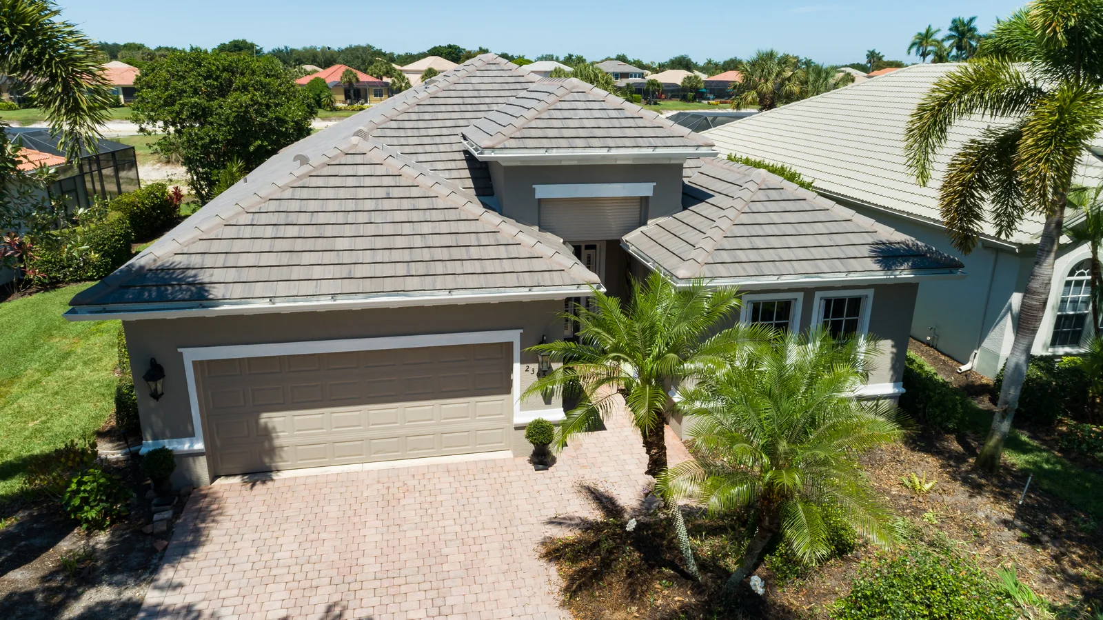 Gray tile roofing across the main roofline, Bonita Springs