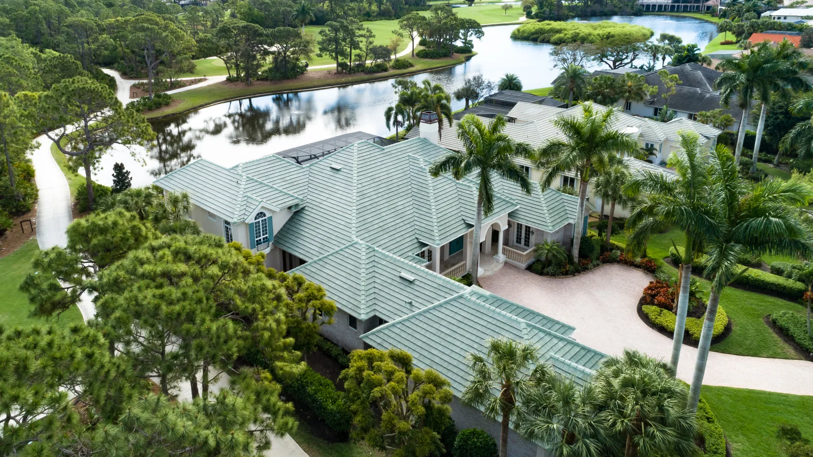 Green tile roofing on a waterfront home, Bonita Springs