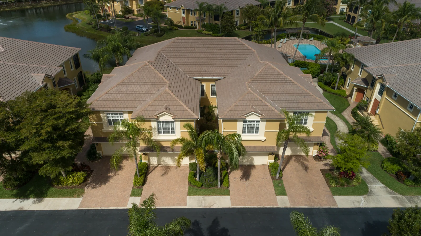 Tile roofing across a multi-unit residential building, Naples